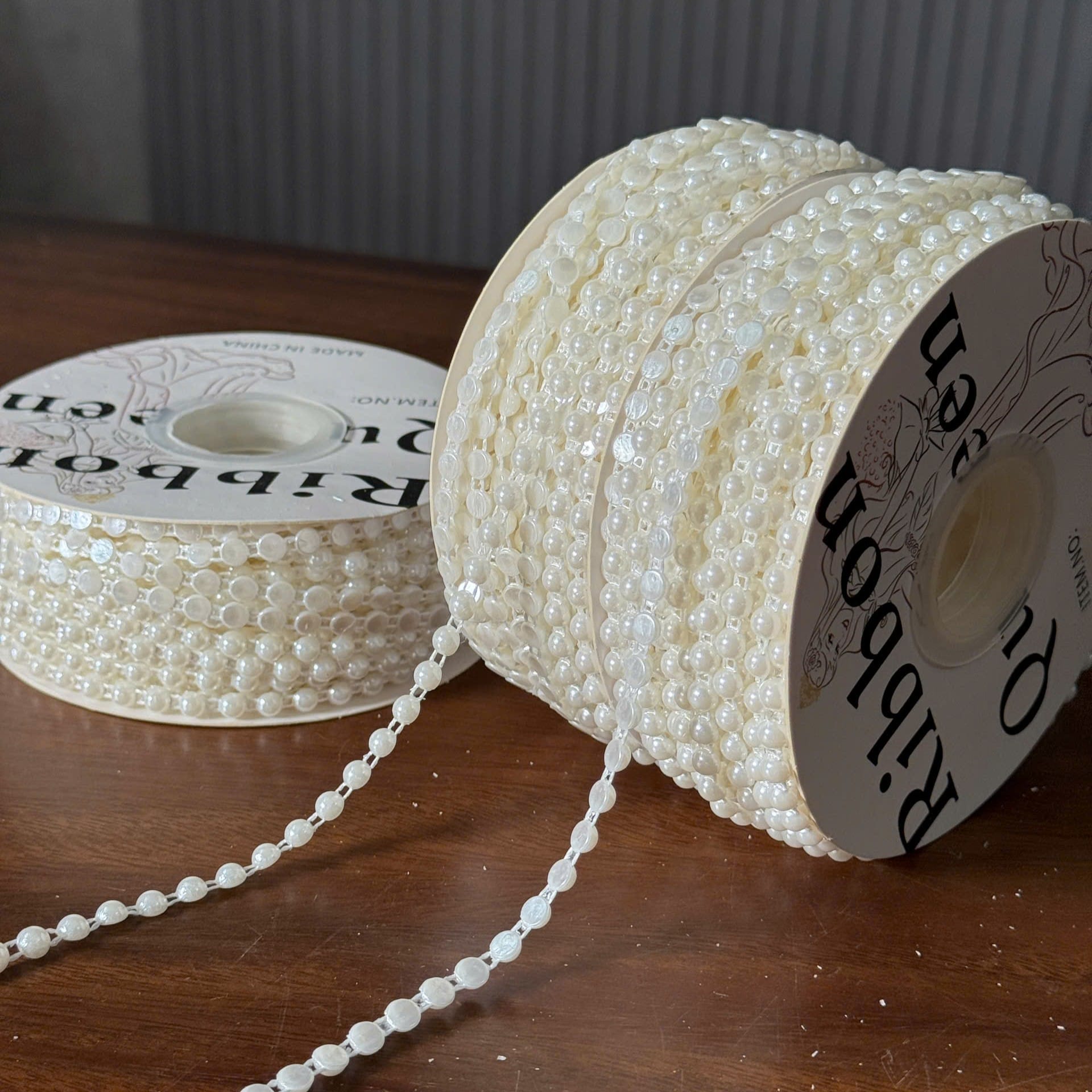 Cuộn Hạt Ngọc Nữa 6mm (25yard) - Sỉ Phụ Kiện Hoa Cuộn Hạt Ngọc Nữa 6mm (25yard)